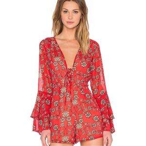 For Love And Lemons Red Floral Jumpsuit with V-Neck and Flutter Sleeves